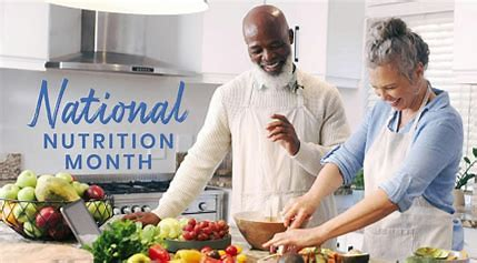 National Nutrition Month with 2 Diversified Chefs working with fresh fruit